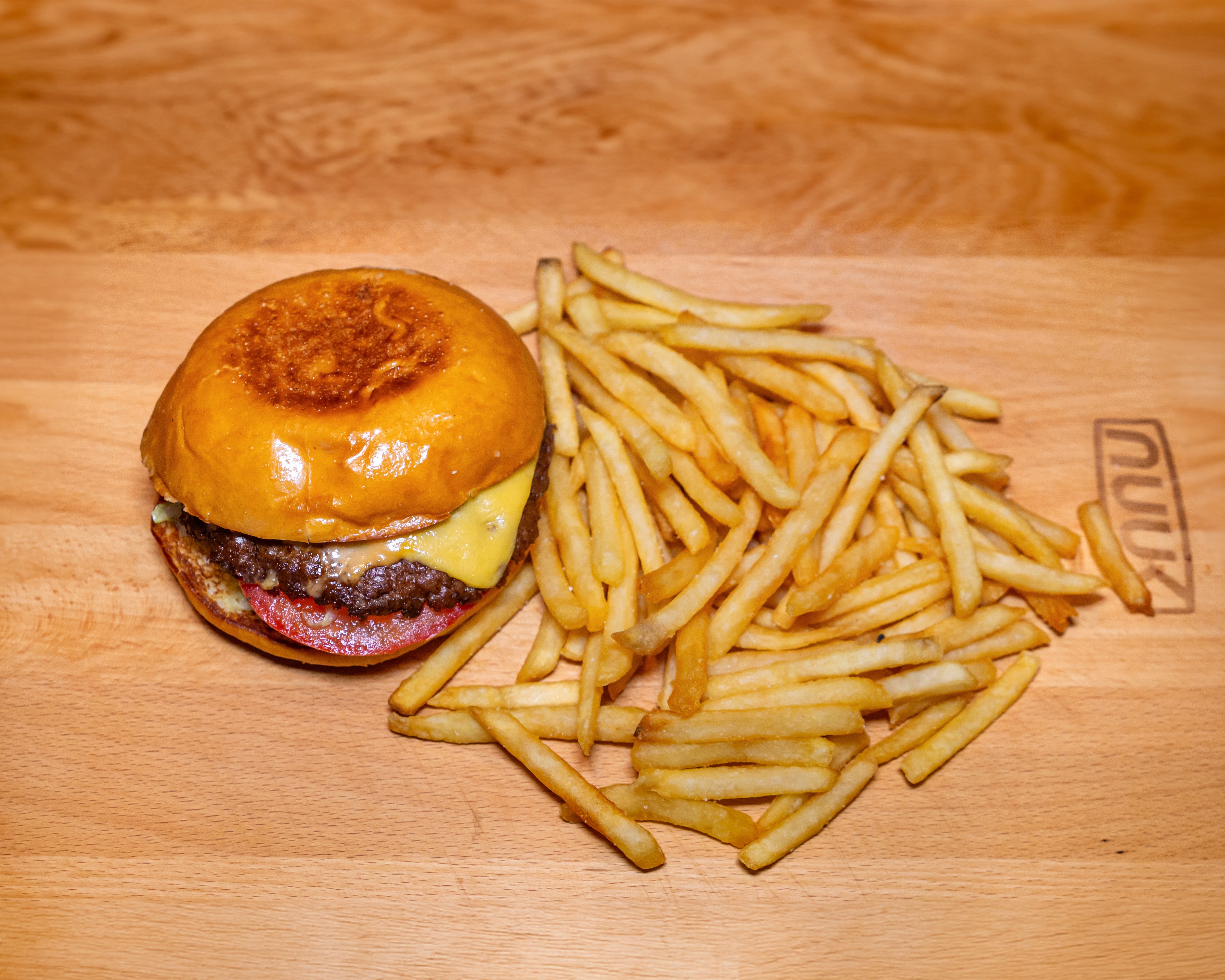 At heart, we’re burger lovers obsessed with quality. What began as a craving became a mission: serve juicy Wagyu smash burgers with fresh ingredients—no shortcuts. Smashed to order, crisp edges, melted cheese, toppings, and signature sauce make every bite bold, honest, and unforgettable. - Image 1